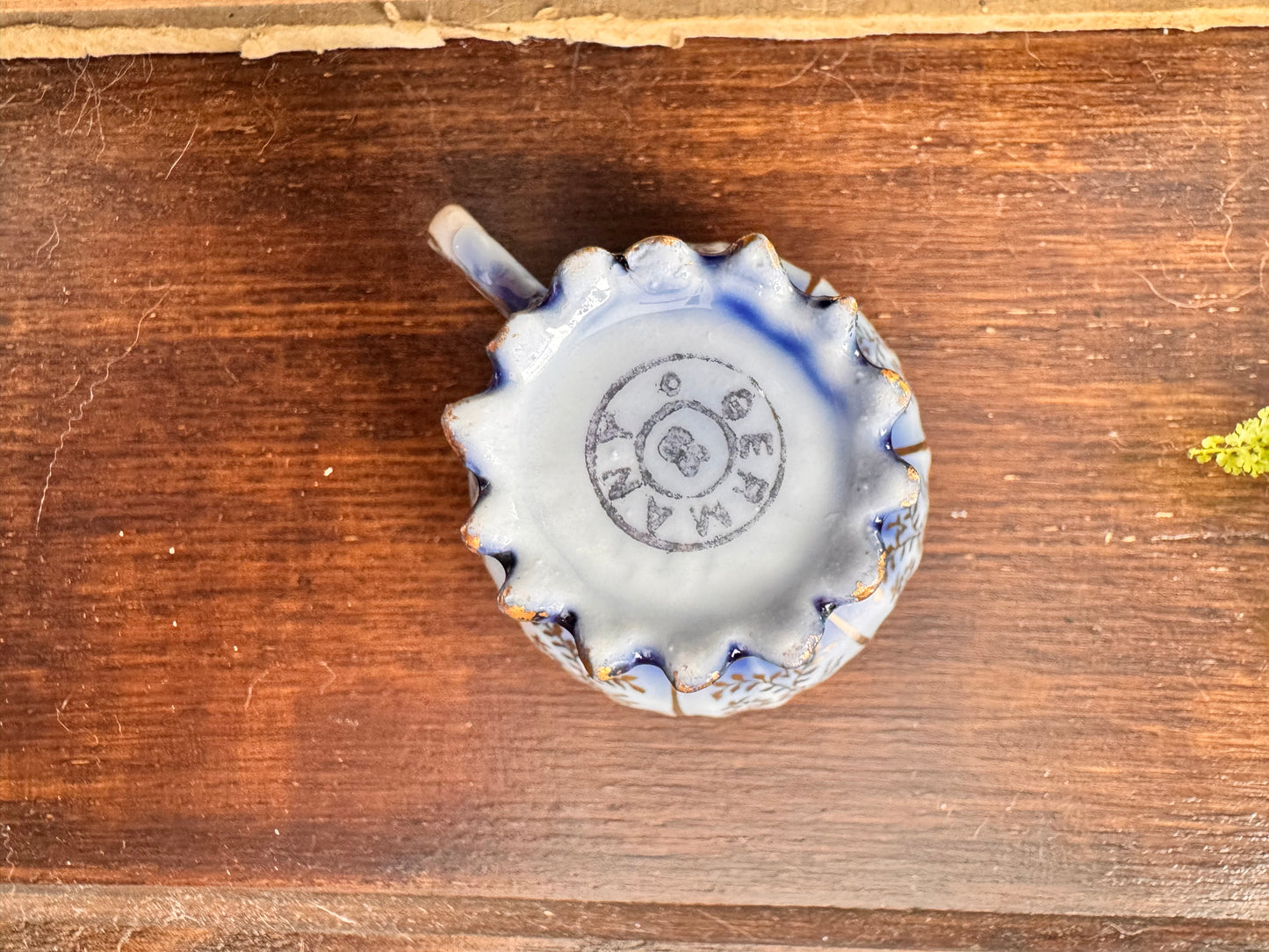 Vintage German Porcelain Demitasse Cup with Gold Floral Detailing.