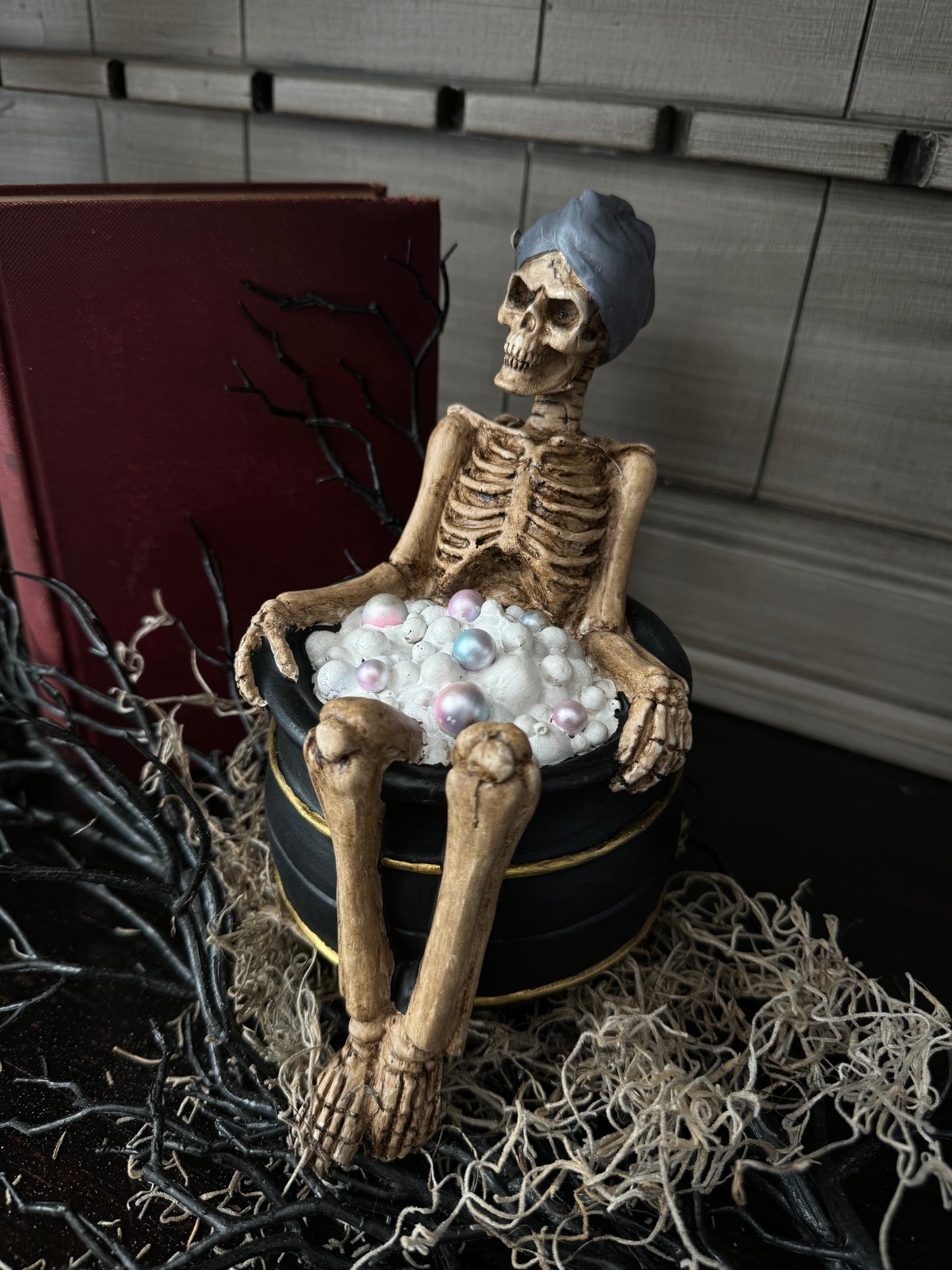 Female Skeleton in Caldron