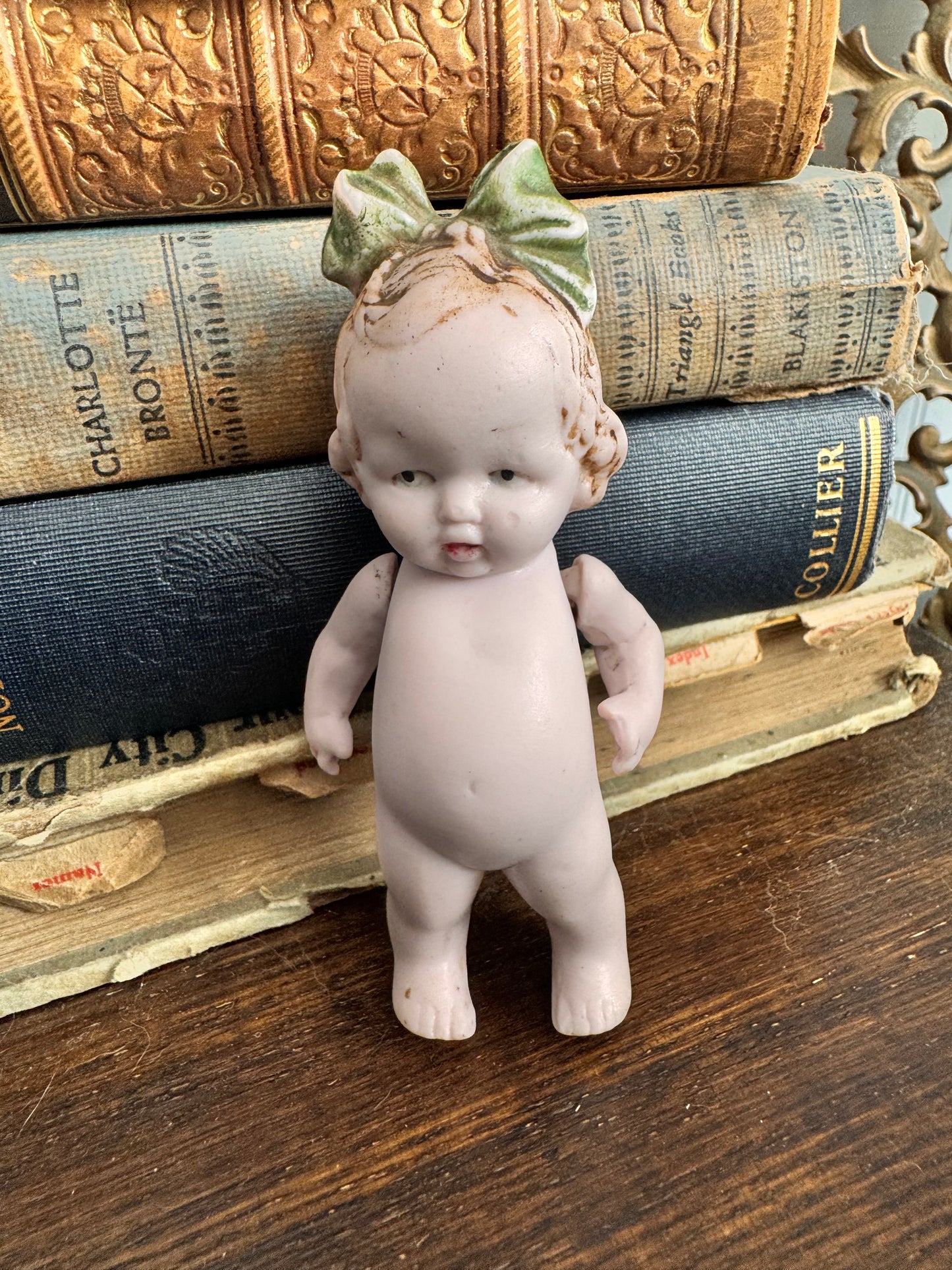 Bisque Doll with Green Bow